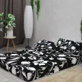 Бескаркасный диван "Белые цветы на черном фоне"